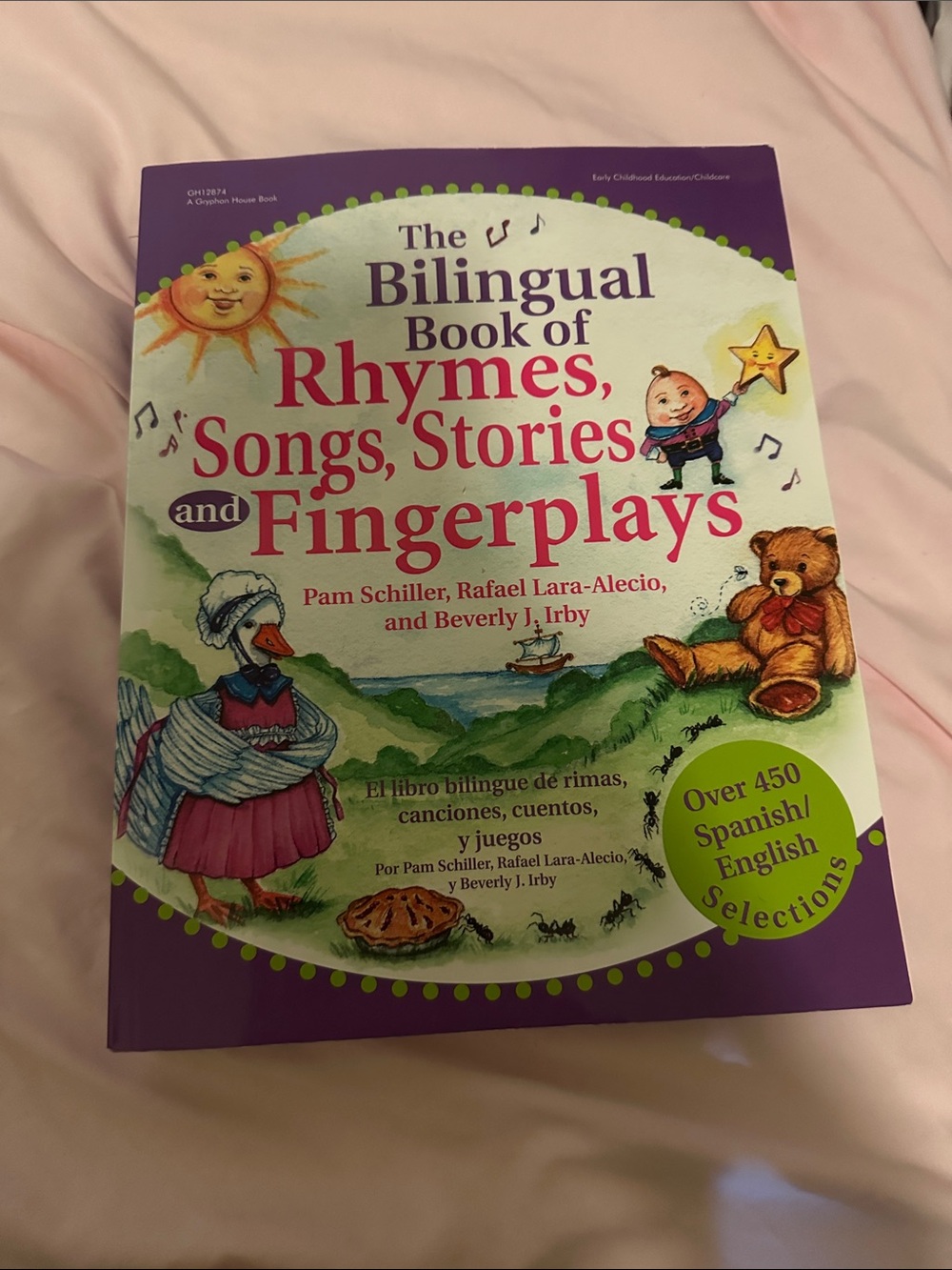 The Bilingual Book of Rhymes, Songs, Stories and Fingerplays - Purple Cover